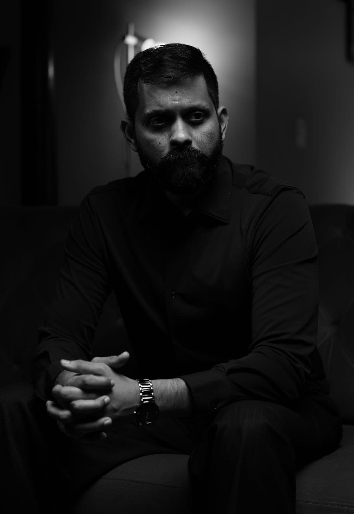 Shashank, seated, facing the camera.