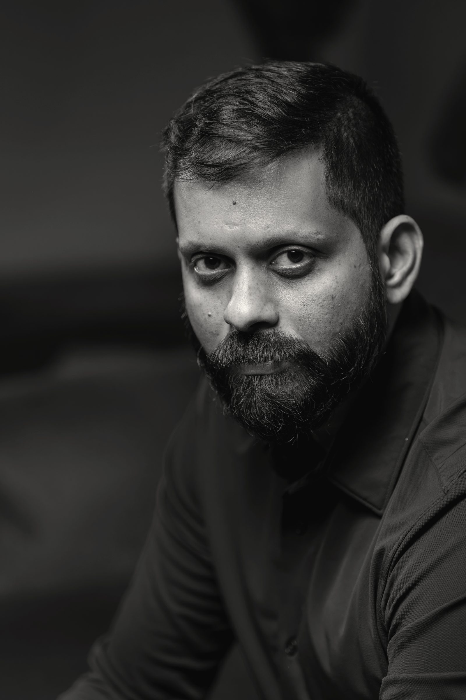 Shashank looking straight into the camera.